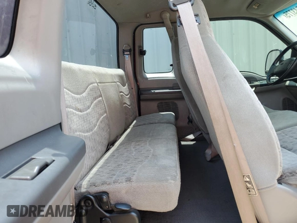 2000 Ford F-250 XL with VIN 1FTNX20L1YEB50589, listed as a Copart auction lot 63743775 with 105,448 mi miles and Salvage title. Bid and sale history available at DreamBid. Image 10.