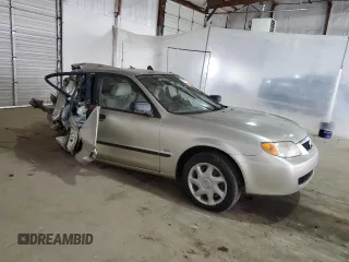 2002 Mazda Protege DX with VIN JM1BJ225021583998, listed as a Copart auction lot 49874135 with Not Provided miles and Non Repairable. Bid and sale history available at DreamBid. Image 4.
