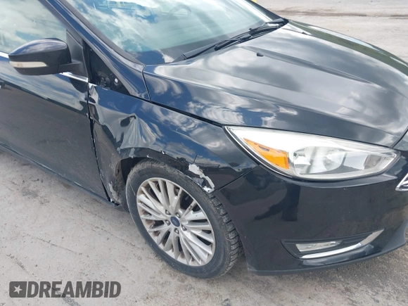 2015 Ford Focus Titanium с VIN 1FADP3J28FL213712, выставлен на аукционе IAAI как лот 42158433 с пробегом 173 696 миль миль и . История ставок и продаж доступна на DreamBid. Изображение 6.