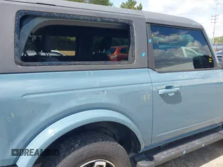 2022 Ford Bronco with VIN 1FMDE5AH3NLA89231, listed as a IAAI auction lot 42399132 with 13,244 mi miles and . Bid and sale history available at DreamBid. Image 6.