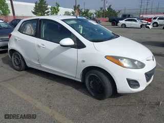 2011 Mazda Mazda2 Sport with VIN JM1DE1HZ5B0117331, listed as a IAAI auction lot 42084291 with 176,619 mi miles. Bid and sale history available at carsss.com. Image 1.