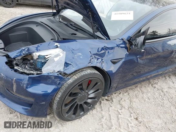 2021 Tesla Model 3 Performance with VIN 5YJ3E1EC6MF996743, listed as a IAAI auction lot 41509631 with 41,599 mi miles and . Bid and sale history available at DreamBid. Image 19.