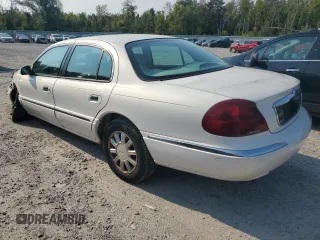 2001 Lincoln Continental with VIN 1LNHM97V91Y659769, listed as a Copart auction lot 71220804 with 0 mi miles and Salvage Title. Bid and sale history available at carsss.com. Image 2.