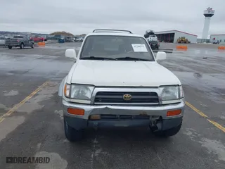 1998 Toyota 4Runner Limited with VIN JT3HN87RXW0148418, listed as a IAAI auction lot 41708975 with 305,530 mi miles. Bid and sale history available at carsss.com. Image 6.