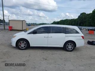 2011 Honda Odyssey EX-L with VIN 5FNRL5H67BB011070, listed as a IAAI auction lot 42491685 with 200,671 mi miles and . Bid and sale history available at DreamBid. Image 14.