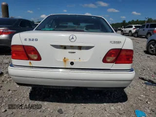 1999 Mercedes-Benz E-Class with VIN WDBJF65H0XA877630, listed as a Copart auction lot 69697454 with 0 mi miles and Salvage Title. Bid and sale history available at carsss.com. Image 6.