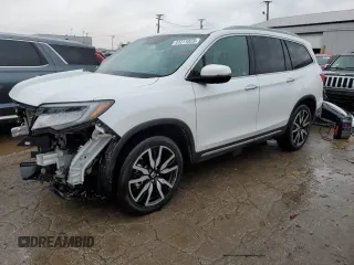 2021 Honda Pilot Touring 7-Passenger z VIN 5FNYF6H66MB023058, wystawiony jako Copart lot #41211023 z przebiegiem 45 255 mil mil oraz Szkoda całkowita • Salvage title. Historia ofert i sprzedaży dostępna na DreamBid. Obrazek 1.