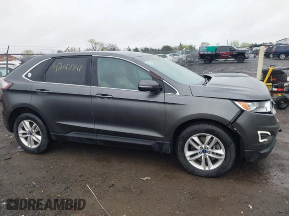 2016 Ford Edge SEL z VIN 2FMPK4J87GBC61845, wystawiony jako IAAI lot #42017547 z przebiegiem 90 710 mil mil oraz . Historia ofert i sprzedaży dostępna na DreamBid. Obrazek 13.