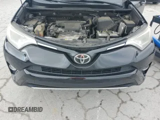 2018 Toyota RAV4 XLE with VIN 2T3WFREV4JW429334, listed as a Copart auction lot 56934855 with 117,761 mi miles and Salvage title. Bid and sale history available at DreamBid. Image 11.