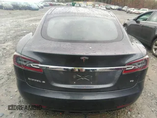 2016 Tesla Model S 70 with VIN 5YJSA1E13GF174542, listed as a IAAI auction lot 41169279 with 72,691 mi miles and . Bid and sale history available at DreamBid. Image 16.
