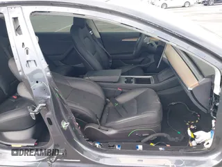 2023 Tesla Model 3 with VIN 5YJ3E1EA4PF410060, listed as a IAAI auction lot 42067624 with 59,934 mi miles and . Bid and sale history available at DreamBid. Image 5.