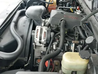 2000 Chevrolet Silverado 1500 z VIN 1GCEC14T0YZ352056, wystawiony jako IAAI lot #42061801 z przebiegiem 127 943 mil mil oraz . Historia ofert i sprzedaży dostępna na DreamBid. Obrazek 19.