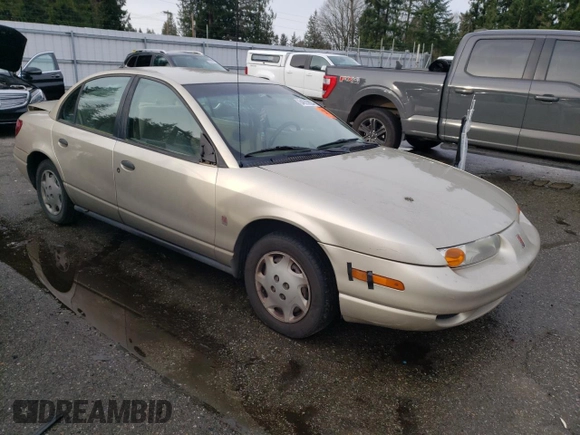 2001 Saturn SL z VIN 1G8ZH52851Z286886, wystawiony jako Copart lot #84883824 z przebiegiem Nie podano mil oraz Szkoda całkowita • Salvage title. Historia ofert i sprzedaży dostępna na DreamBid. Obrazek 4.