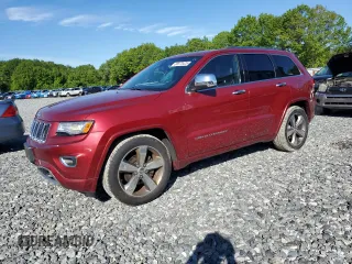 2015 Jeep Grand Cherokee Overland z VIN 1C4RJFCG5FC855834, wystawiony jako Copart lot #58573425 z przebiegiem 173 521 mil mil oraz Czysty tytuł • Clean title. Historia ofert i sprzedaży dostępna na DreamBid. Obrazek 1.