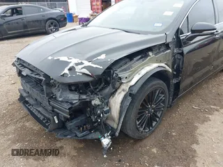 2014 Ford Fusion SE with VIN 1FA6P0HDXE5356467, listed as a IAAI auction lot 41252963 with 147,252 mi miles and . Bid and sale history available at DreamBid. Image 6.