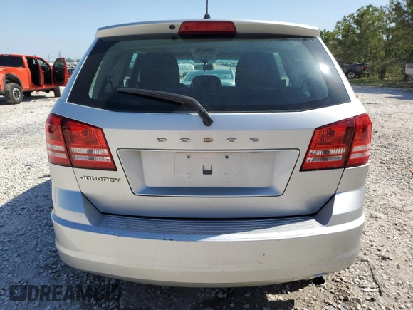 2013 Dodge Journey American Value with VIN 3C4PDCAB1DT715799, listed as a Copart auction lot 52404815 with 185,559 mi miles and Salvage Title. Bid and sale history available at DreamBid. Image 6.