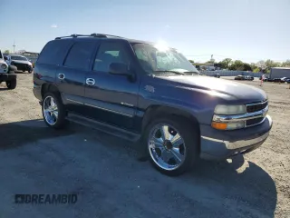 2002 Chevrolet Tahoe LS z VIN 1GNEC13T42R256432, wystawiony jako Copart lot #51706375 z przebiegiem 193 298 mil mil oraz Szkoda całkowita • Salvage title. Historia ofert i sprzedaży dostępna na DreamBid. Obrazek 4.