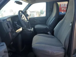 2012 GMC Savana z VIN 1GJZ71FG8C1132413, wystawiony jako Copart lot #74216844 z przebiegiem 145 959 mil mil oraz Szkoda całkowita • Salvage title. Historia ofert i sprzedaży dostępna na DreamBid. Obrazek 7.