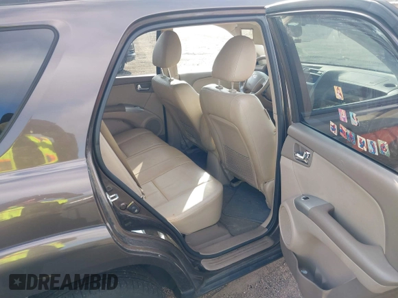 2009 Kia Sportage LX with VIN KNDJE723097623239, listed as a IAAI auction lot 41233933 with 169,444 mi miles. Bid and sale history available at carsss.com. Image 8.