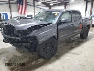 2023 Toyota Tacoma SR z VIN 3TYCZ5AN5PT145539, wystawiony jako Copart lot #58309255 z przebiegiem Nie podano mil oraz Szkoda całkowita • Salvage title. Historia ofert i sprzedaży dostępna na DreamBid. Obrazek 1.
