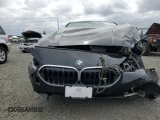 2021 BMW 2 Series 228i xDrive with VIN WBA73AK05M7H59412, listed as a Copart auction lot 54728865 with 56,718 mi miles and Clean Title. Bid and sale history available at carsss.com. Image 5.