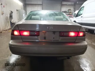1999 Toyota Camry LE с VIN 4T1BG22K4XU469265, выставлен на аукционе Copart как лот 80112794 с пробегом 184 782 миль миль и Списание • Salvage title. История ставок и продаж доступна на DreamBid. Изображение 6.