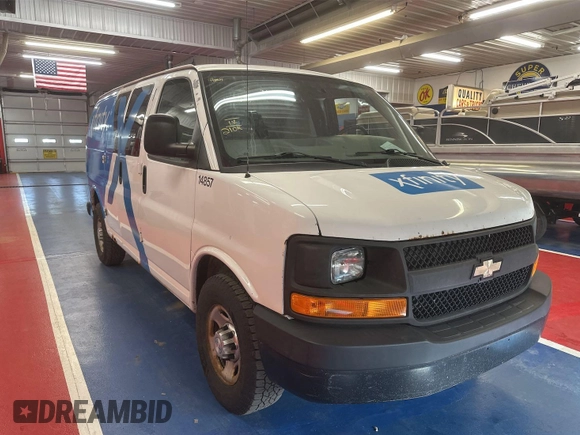 2014 Chevrolet Express Cargo z VIN 1GCWGFCA7E1198607, wystawiony jako IAAI lot #42480161 z przebiegiem 210 462 mil mil oraz . Historia ofert i sprzedaży dostępna na DreamBid. Obrazek 2.