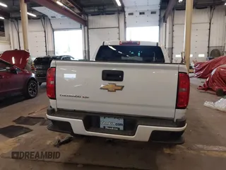 2019 Chevrolet Colorado 2WD Work Truck with VIN 1GCGSBEN6K1349332, listed as a IAAI auction lot 41900272 with 68,657 mi miles and . Bid and sale history available at DreamBid. Image 16.