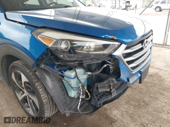 2018 Hyundai Tucson Sport with VIN KM8J33AL0JU803368, listed as a IAAI auction lot 41937235 with 64,163 mi miles and . Bid and sale history available at DreamBid. Image 6.