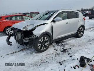 2012 Kia Sportage SX with VIN KNDPCCA60C7267399, listed as a Copart auction lot 88774055 with 124,584 mi miles and Salvage title. Bid and sale history available at DreamBid. Image 1.