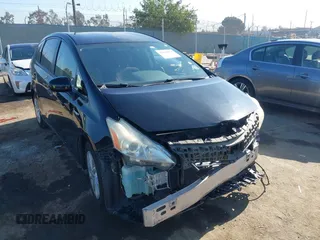 2013 Toyota Prius Two with VIN JTDZN3EU2D3193553, listed as a IAAI auction lot 42631074 with 187,717 mi miles and . Bid and sale history available at DreamBid. Image 1.