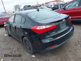 2015 Kia Forte LX with VIN KNAFX4A68F5392766, listed as a IAAI auction lot 41942314 with 229,927 mi miles. Bid and sale history available at carsss.com. Image 3.