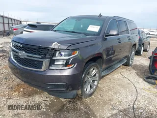 2015 Chevrolet Suburban LT with VIN 1GNSKJKC8FR717435, listed as a IAAI auction lot 41313726 with 120,731 mi miles and . Bid and sale history available at DreamBid. Image 17.
