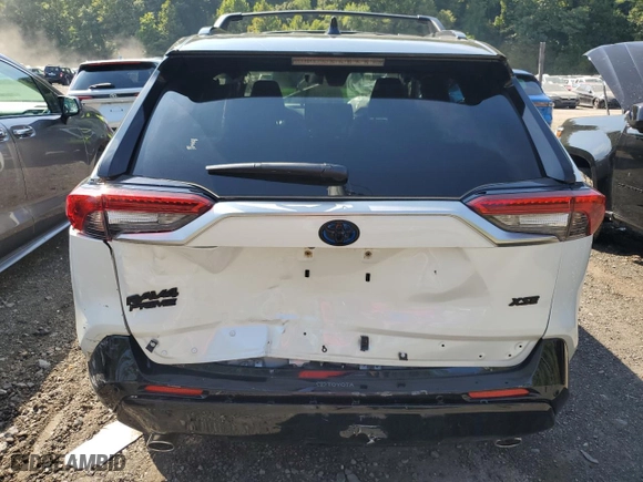 2024 Toyota RAV4 Prime XSE with VIN JTMFB3FVXRD173281, listed as a Copart auction lot 79828874 with 5,949 mi miles and Salvage Title. Bid and sale history available at carsss.com. Image 6.