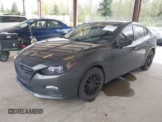 2015 Mazda 3 i Sport with VIN JM1BM1U70F1272383, listed as a IAAI auction lot 42013894 with 97,029 mi miles and . Bid and sale history available at carsss.com. Image 2.