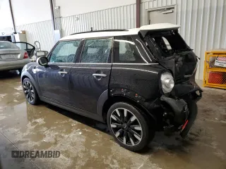 2017 MINI Hardtop 4 Door Cooper S z VIN WMWXU3C33H2F49198, wystawiony jako Copart lot #45210935 z przebiegiem 139 332 mil mil oraz Szkody całkowita. Historia ofert i sprzedaży dostępna na DreamBid. Obrazek 2.