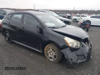 2010 Pontiac Vibe w/1SB with VIN 5Y2SP6E03AZ404584, listed as a IAAI auction lot 41133592 with 199,271 mi miles. Bid and sale history available at carsss.com. Image 1.