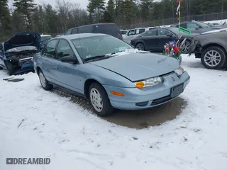 2002 Saturn SL with VIN 1G8ZK527X2Z303241, listed as a IAAI auction lot 41319176 with 94,387 mi miles. Bid and sale history available at carsss.com. Image 1.