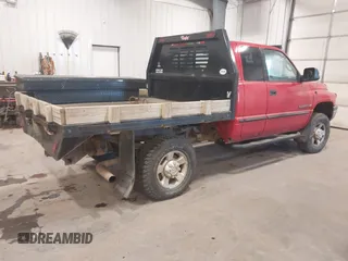 1999 Dodge Ram 2500 with VIN 1B7KF23W2XJ617522, listed as a IAAI auction lot 41442384 with 106,649 mi miles. Bid and sale history available at carsss.com. Image 4.