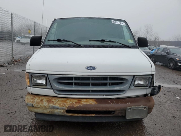 2001 Ford Econoline Cargo with VIN 1FTRE142X1HB27593, listed as a Copart auction lot 83827154 with 190,761 mi miles and Salvage Title. Bid and sale history available at DreamBid. Image 5.