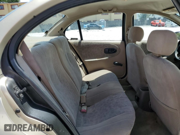 1999 Saturn SL with VIN 1G8ZK5271XZ226783, listed as a Copart auction lot 56467315 with 86,168 mi miles and Salvage title. Bid and sale history available at DreamBid. Image 10.