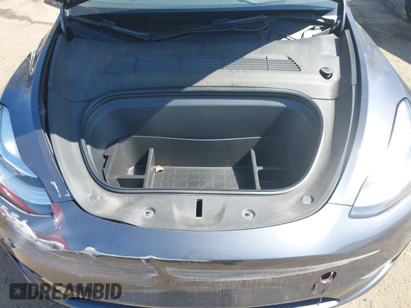 2022 Tesla Model Y Long Range z VIN 7SAYGAEE9NF574634, wystawiony jako IAAI lot #42040719 z przebiegiem 29 675 mil mil oraz . Historia ofert i sprzedaży dostępna na DreamBid. Obrazek 10.
