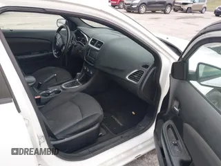 2012 Dodge Avenger SE with VIN 1C3CDZAB0CN110886, listed as a IAAI auction lot 41169873 with Not Provided miles and . Bid and sale history available at DreamBid. Image 5.