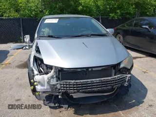 2010 Honda Insight EX with VIN JHMZE2H78AS016893, listed as a IAAI auction lot 42420778 with 207,491 mi miles and . Bid and sale history available at DreamBid. Image 6.