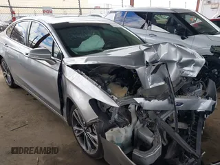 2020 Ford Fusion Titanium with VIN 3FA6P0D97LR193031, listed as a IAAI auction lot 41731413 with 125,748 mi miles and . Bid and sale history available at DreamBid. Image 1.