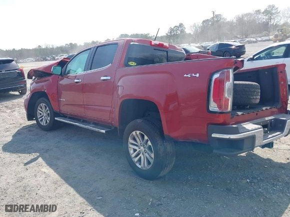 2016 GMC Canyon 4WD SLT with VIN 1GTG6DE31G1113435, listed as a IAAI auction lot 41804644 with 126,440 mi miles. Bid and sale history available at carsss.com. Image 3.