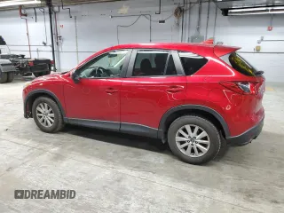 2016 Mazda CX-5 Touring z VIN JM3KE4CY6G0647362, wystawiony jako Copart lot #58081855 z przebiegiem 86 372 mil mil oraz Szkoda całkowita • Salvage title. Historia ofert i sprzedaży dostępna na DreamBid. Obrazek 2.