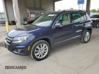 2014 Volkswagen Tiguan SEL with VIN WVGBV3AX9EW528255, listed as a Copart auction lot 56741795 with 103,578 mi miles and Clean title. Bid and sale history available at DreamBid. Image 1.