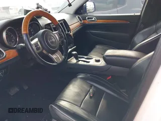 2011 Jeep Grand Cherokee Overland Summit with VIN 1J4RR6GT9BC586712, listed as a IAAI auction lot 42427655 with 157,549 mi miles and . Bid and sale history available at DreamBid. Image 5.