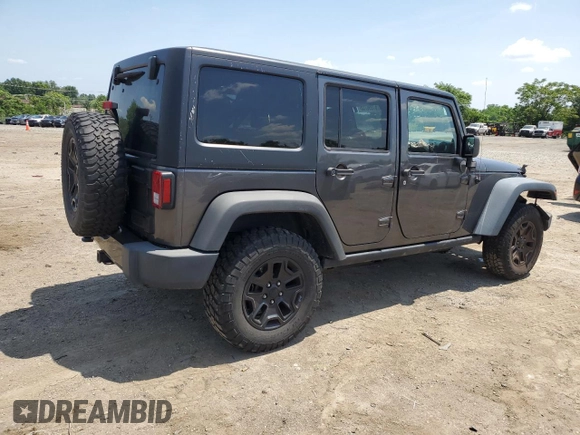 2014 Jeep Wrangler Unlimited Sport with VIN 1C4BJWDG1EL298161, listed as a Copart auction lot 61996735 with 176,043 mi miles and Salvage title. Bid and sale history available at DreamBid. Image 3.